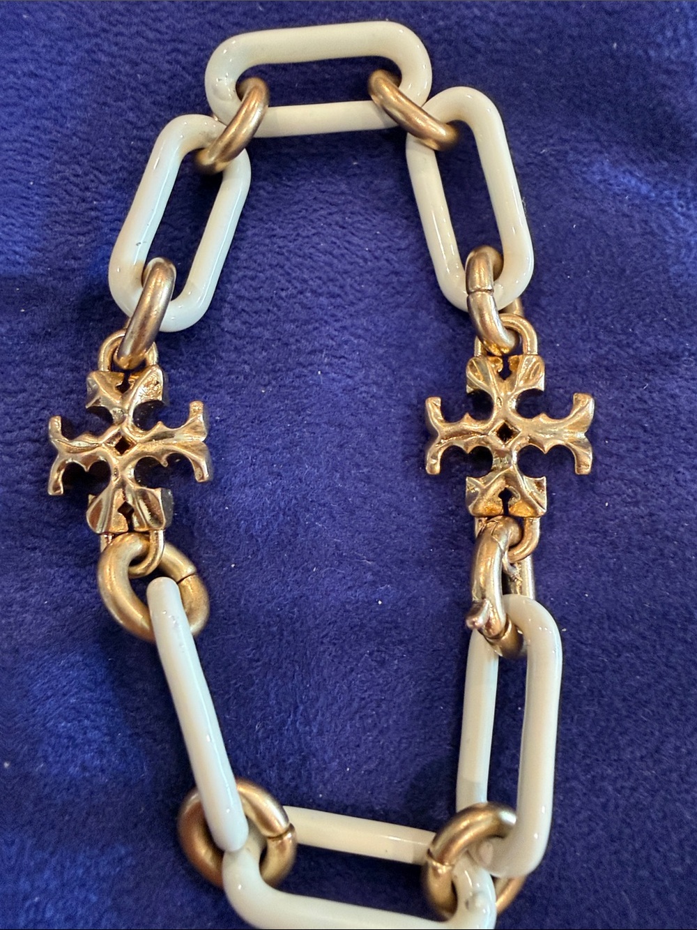 Tory Burch Gold and Cream Chain Link Bracelet with Decorative Cross Accents